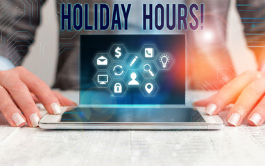 Conceptual hand writing showing Holiday Hours. Concept meaning Overtime work on for employees under...