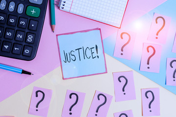 Conceptual hand writing showing Justice. Concept meaning impartial adjustment of conflicting claims or assignments Mathematics stuff and writing equipment on pastel background