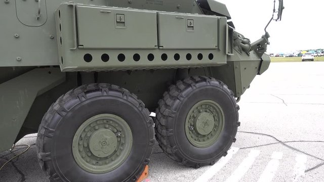Big Tank Wheels Military Vehicle Left To Right Closeup Panorama