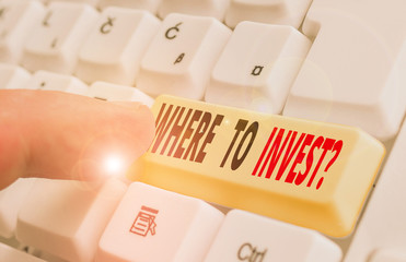 Writing note showing Where To Invest Question. Business concept for asking about where put money...
