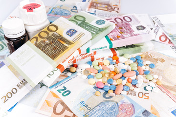 The pills are on European money. Pills and Euro money. Euro notes and pills.