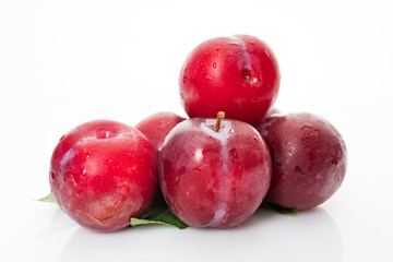 fresh plum isolated on white background
