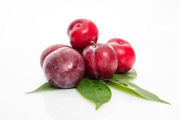 fresh plum isolated on white background