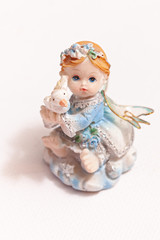 Porcelain doll figurine, little girl toy figurine.