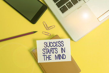 Conceptual hand writing showing Success Starts In The Mind. Concept meaning set your mind to positivity it can go a long way Laptop smartphone clip pencil paper sheet colored background