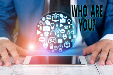 Conceptual hand writing showing Who Are You Question. Concept meaning asking about someone identity...