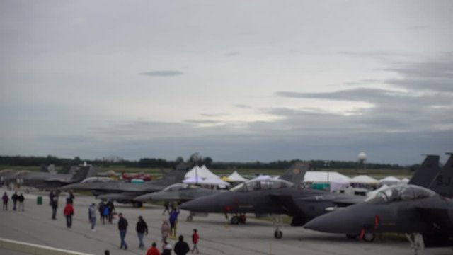 Blurred Aerial Wide Angle Shot Of People Walking Outdoors At Outdoor Airshow