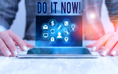 Conceptual hand writing showing Do It Now. Concept meaning not hesitate and start working or doing stuff right away