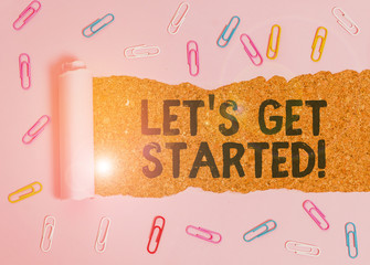 Conceptual hand writing showing Let S Get Started. Concept meaning encouraging someone to begin...