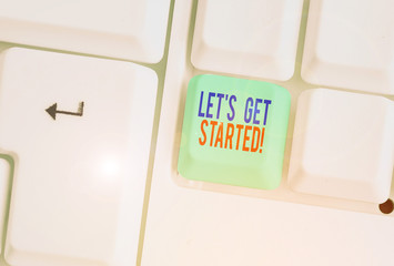 Conceptual hand writing showing Let S Get Started. Concept meaning encouraging someone to begin...