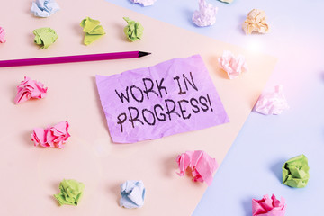Writing note showing Work In Progress. Business concept for unfinished project that still added to...