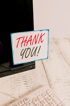 Handwriting Text Writing Thank You. Conceptual Photo Polite Expression Used When Acknowledging Gift Service Compliment Notation Paper Taped To Black Computer Monitor Screen Near White Keyboard