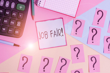 Conceptual hand writing showing Job Fair. Concept meaning event in which employers recruiters give information to employees Mathematics stuff and writing equipment on pastel background