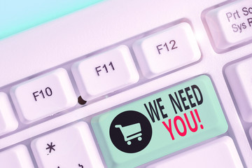 Writing note showing We Need You. Business concept for asking someone to work together for certain...