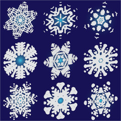 Set of christmas paper snowflakes on blue background.