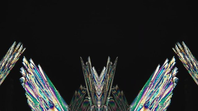 Psychedelic Moving Background. Crystal Growth Under Microscope Timelapse