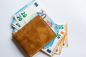Euro money in leather wallet business finance