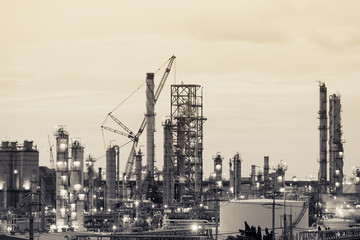 Oil and gas refinery plant or petrochemical industry, Heavy equipment in petroleum industrial plant with monotone