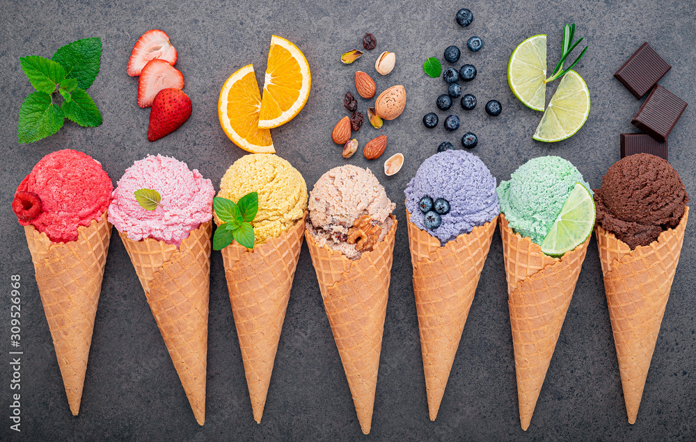 Leinwandbilder Flat lay ice cream cones collection on dark stone background . Blank crispy ice cream cone with copy space for sweets menu design.