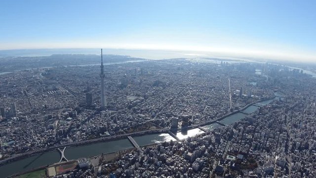 東京都市風景とスカイツリーと隅田川の空撮