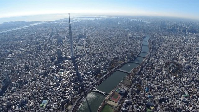 東京都市風景とスカイツリーと隅田川の空撮