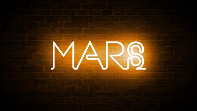 A high quality video of a neon sign that reads: MARS