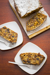 Christmas loaf cake with pecans, raisins, figs, cherries and brandy