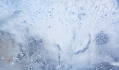Ice background. The frozen texture of the water