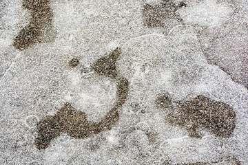 Ice background. The frozen texture of the water