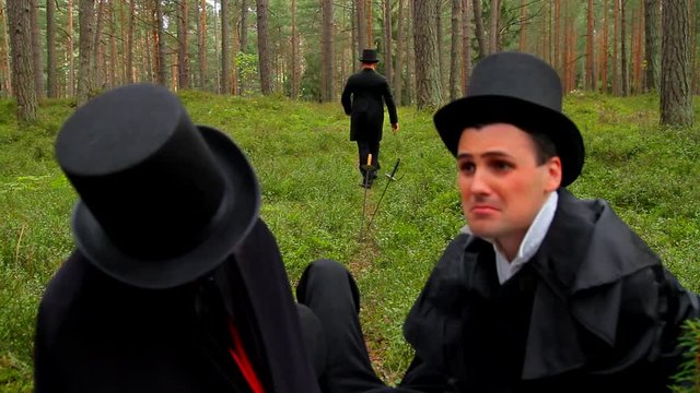 Conflict, duel,  men with pistols in forest, victorian clothes