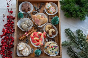 Traditional home made German Christmas Cookies on a festive christmas background