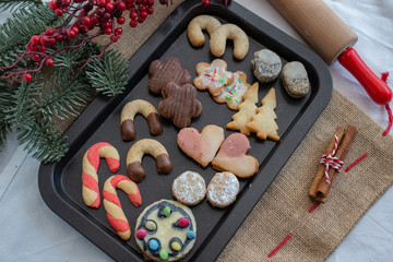 Traditional home made German Christmas Cookies on a festive christmas background