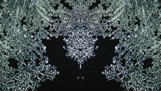 Psychedelic Moving Background. Crystal Growth Under Microscope Timelapse