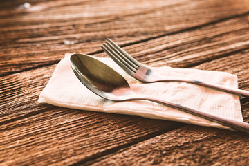 High Angle View Of Spoon And Fork On Table
