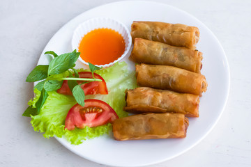 traditional vietnamese dish. Spring rolls, homemade egg rolls, vegetarian food. Asia street food, view from above, soft focus