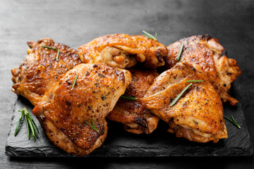 Grilled chicken thighs with spices and lemon.  - 309544975
