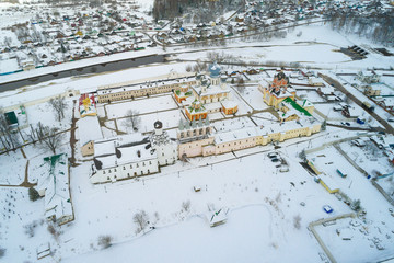 Tikhvin Virgin Assumption Monastery on March day. Top view (shooting from a quadrocopter). Tikhvin, Russia