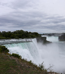 View of the Niagara Falls from the USA side and clouds in the background