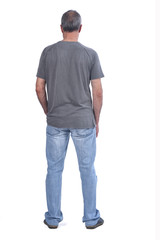 Fototapeta premium rear view of middle-aged on white background