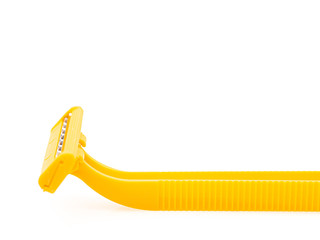 Close up : Yellow razor isolated on white background. Select focus.