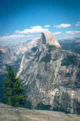 Panoramic view from Glacier Point over Yosemite Valley. Yosemite Valley is a glacial valley in Yosemite National Park in the western Sierra Nevada mountains of Northern California.