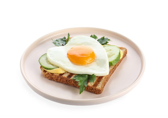 Plate of tasty sandwich with heart shaped fried egg isolated on white
