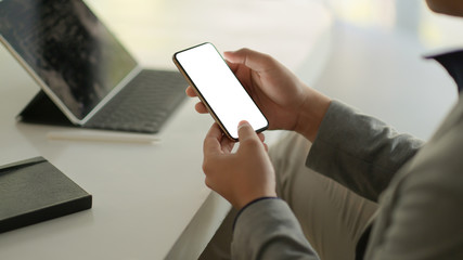 Business people using smartphone blank screen.