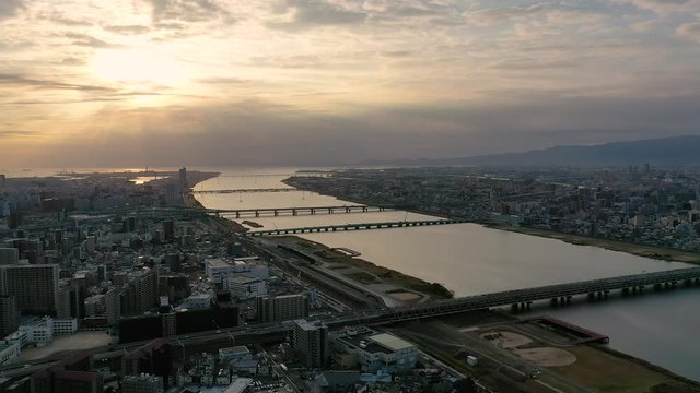 Aerial view 4k video by drone of River and building in Osaka city, Japan.