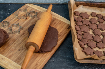 making Christmas butter cookies with cinnamon and chocolate