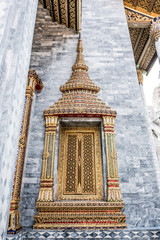 Obraz na płótnie Canvas The beautiful of temple thai style windows. Gold historic window at temple.