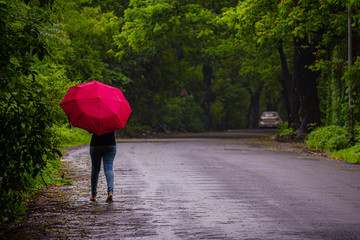 woman with umbrella in the rain