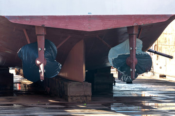 propeller and rudder of a ship in dockyard