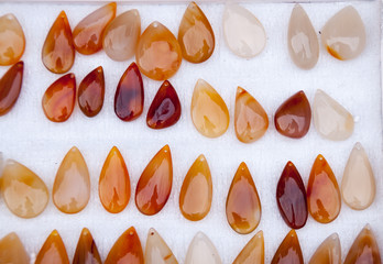 China, Heihe, July 2019: moonstone Pendants, morning market in Heihe in summer
