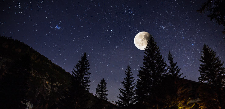 Starry sky and full moon over the Alps, Italy - Powered by Adobe